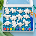 Little Gray Co Dinosaur Party Paint Kit with dinosaur pieces, paints and brushes