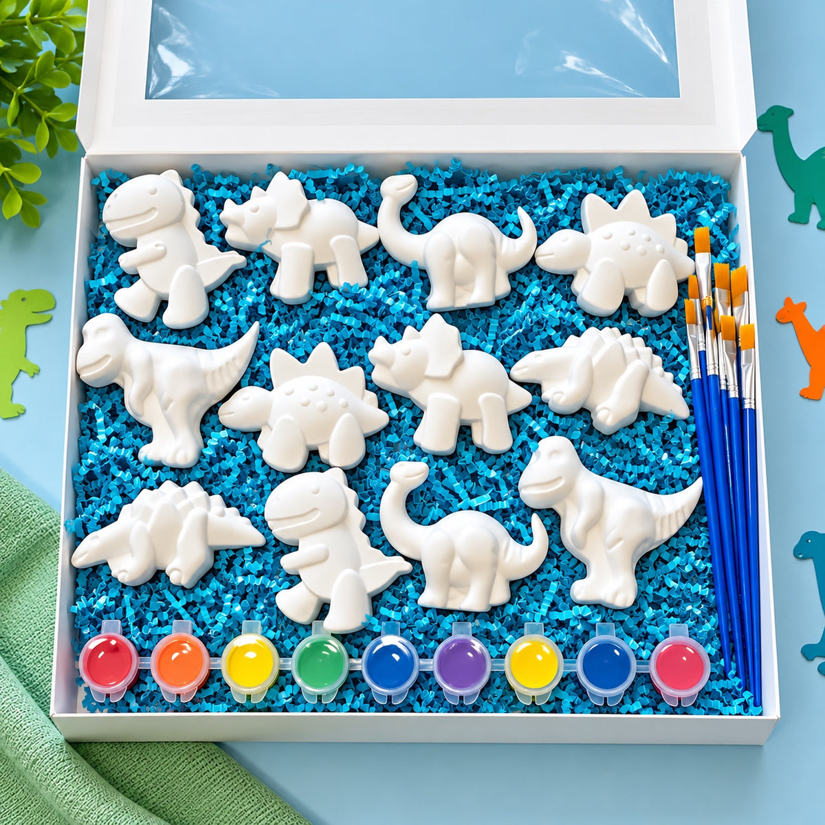 Little Gray Co Dinosaur Party Paint Kit with dinosaur pieces, paints and brushes